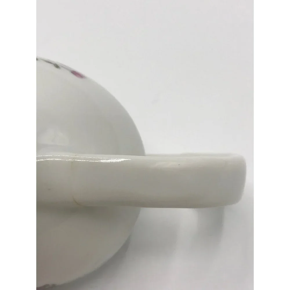 Vintage made in Japan small porcelain gravy/sauce boat.